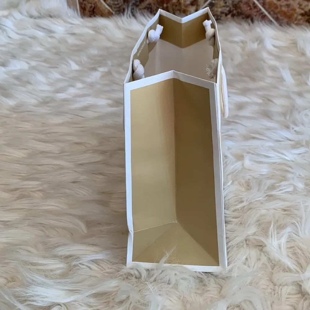 Tan and White Michael Kors Paper Shopping Bag